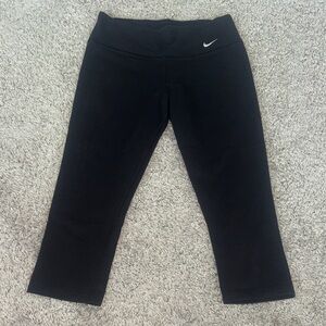 Nike women’s Dark capri Leggings with White Logo